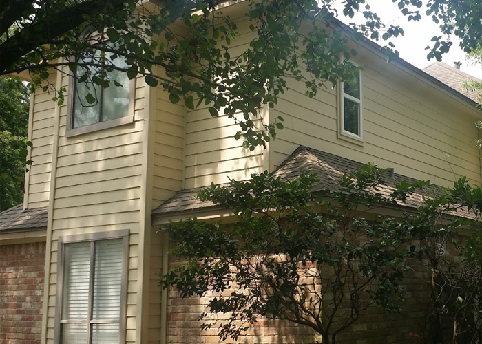 Hardiplank siding installation and paint on two story home.